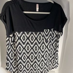 Versatile, summer blouse. Dress it up or down. Very light weight.